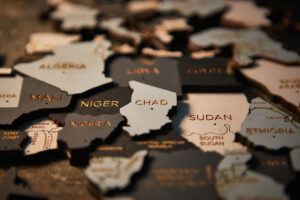 Niger, Chad and Sudan on wooden map of African continent
