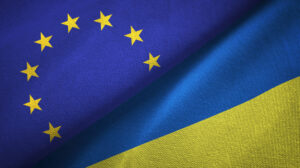 European Union and Ukraine two flags textile cloth, fabric texture