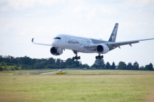 BERLIN / GERMANY – JUNE 3,2016: Airbus A 350 – 900 plane lands on airport in Berlin / Germany on June 3, 2016.