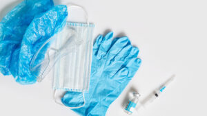 Individual protection means, hat, goggles, gloves, antiviral mask and syringe with vaccine